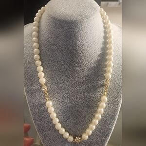 Avon White Pearl Necklace with Gold Details.